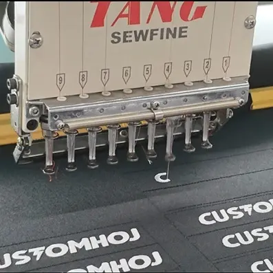 Embroidery machine producing custom badges